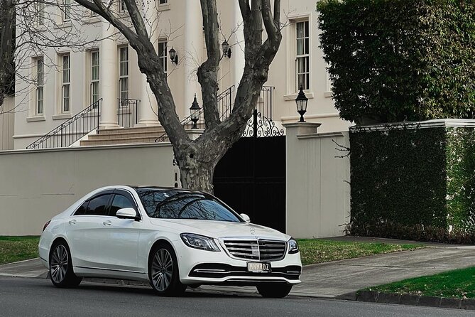 Airport Transfers - Chauffeur Car & Limo Services of Melbourne - Inside the ride: comfort, water, and staying connected
