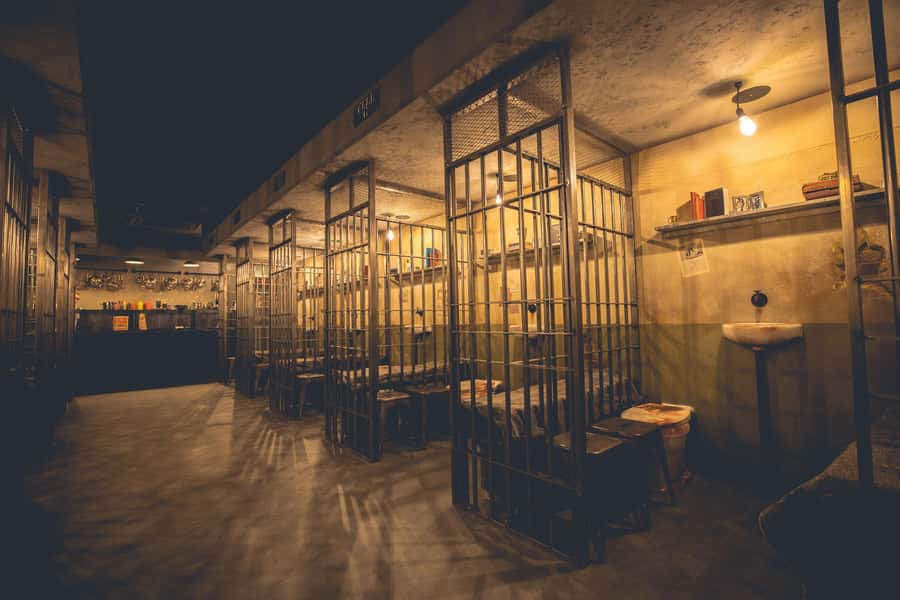 Alcotraz Melbourne: World’s First Prison-Themed Cocktail Bar - Alcotraz Melbourne in a Nutshell: prison bars, orange jumpsuits, and four drinks