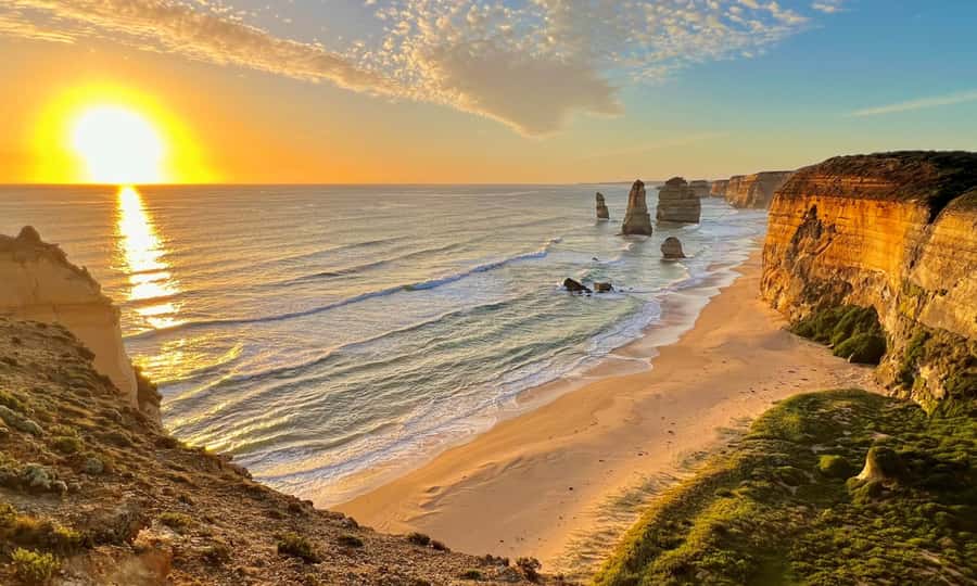 From Melbourne: Great Ocean Road Full-Day Sunset Tour - Loch Ard Gorge: where the cliffs start feeling personal
