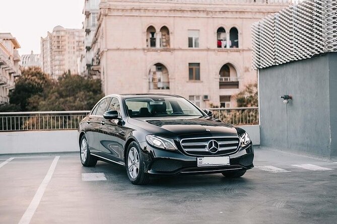 Luxury Airport Transfer to Melbourne CBD - Inside the Ride: Water, Door Opening, and Luggage First