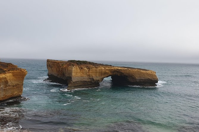 Private Great Ocean Road Day Trip from Melbourne - Split Point Lighthouse and the Memorial Archway: the ocean meeting point